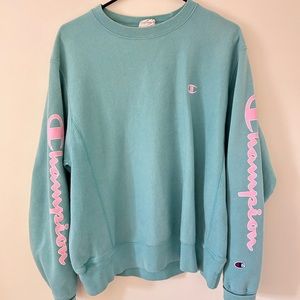 Champion men’s hoodie from urban outfitters turquoise with pink logo size medium